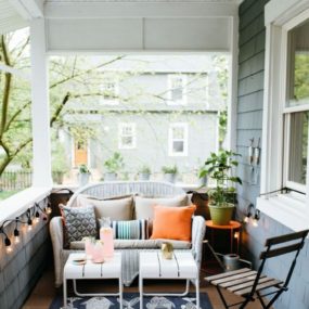 If you happen to have a smaller porch add a small seating area with a nice rug and small tables. This will create an extension of your living room.