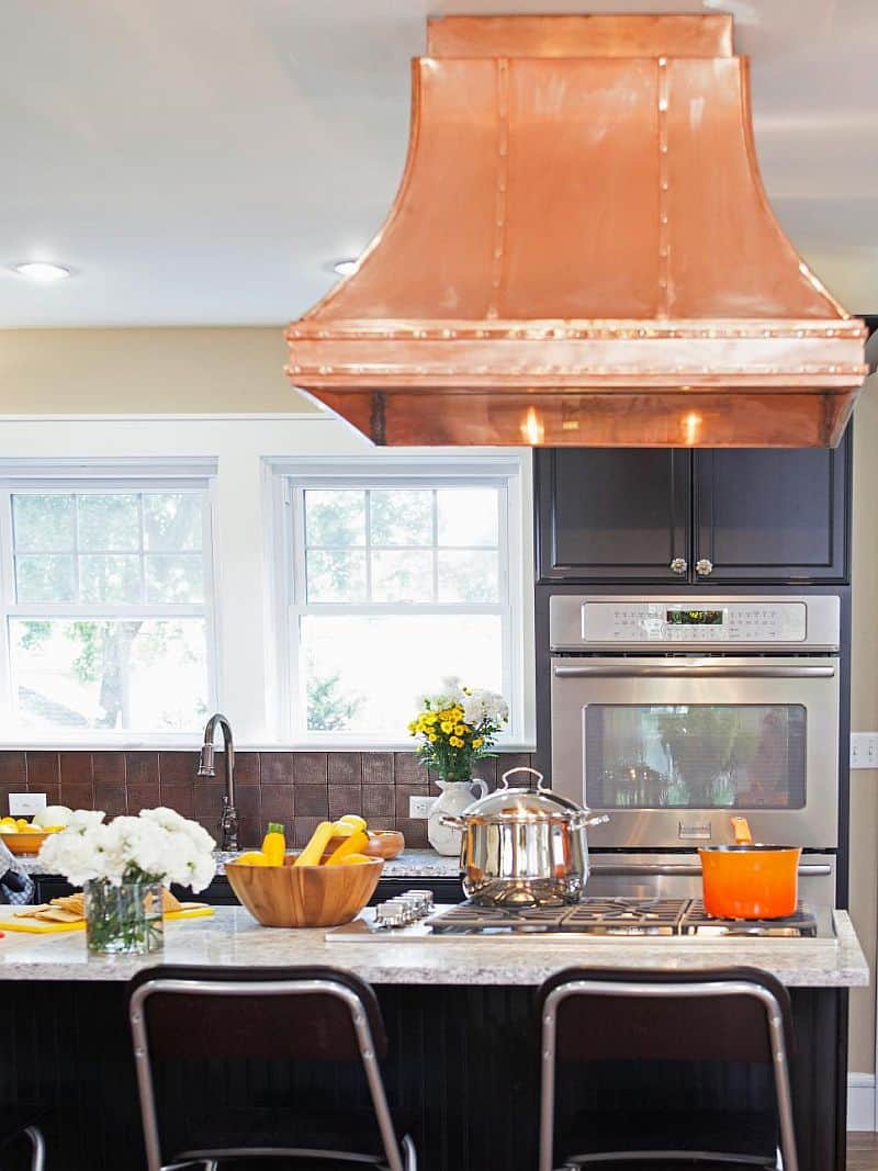 Black Kitchen with Copper Hood