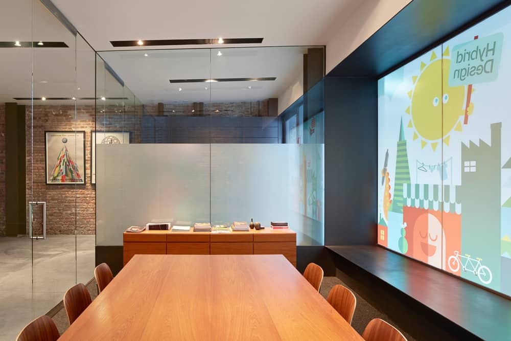 A large bay window visually enhances space inside the conference room