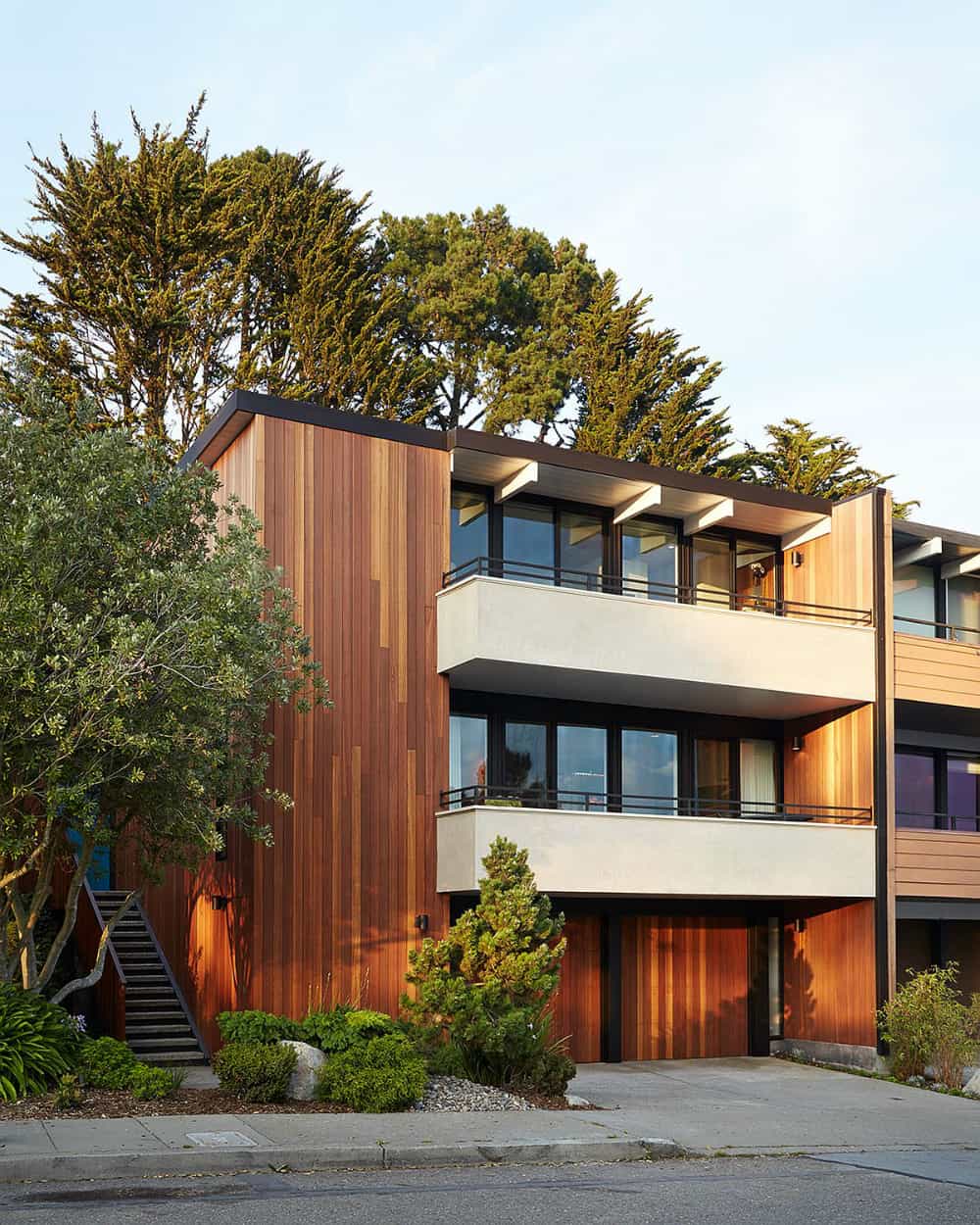 Kayu Batu wood siding contrasts with black framing which always makes for a stylish look