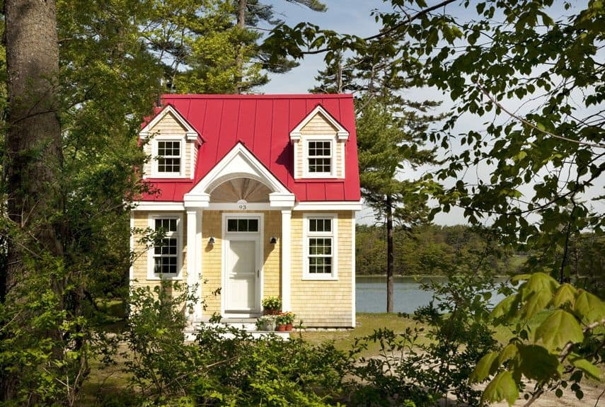 Small cottage house with red roof