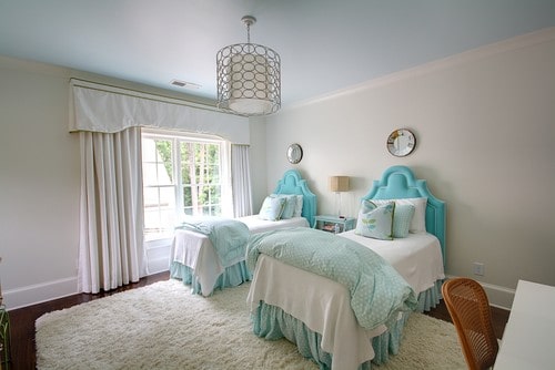 traditional bedroom for twins in turquoise