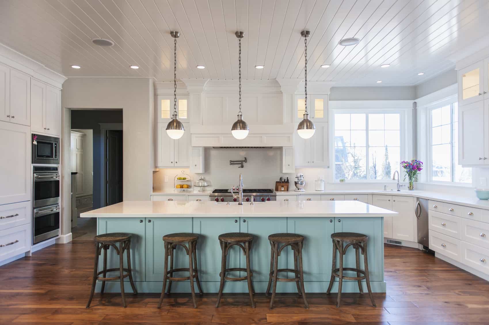 two-tone-kitchen-cabinet-and-painted-wood-floors-with-barstools-also-pendant-lighting-and-windows-with-beadboard-ceilings-plus-painting-hardwood-floors-and-benjamin-moore-floor-paint