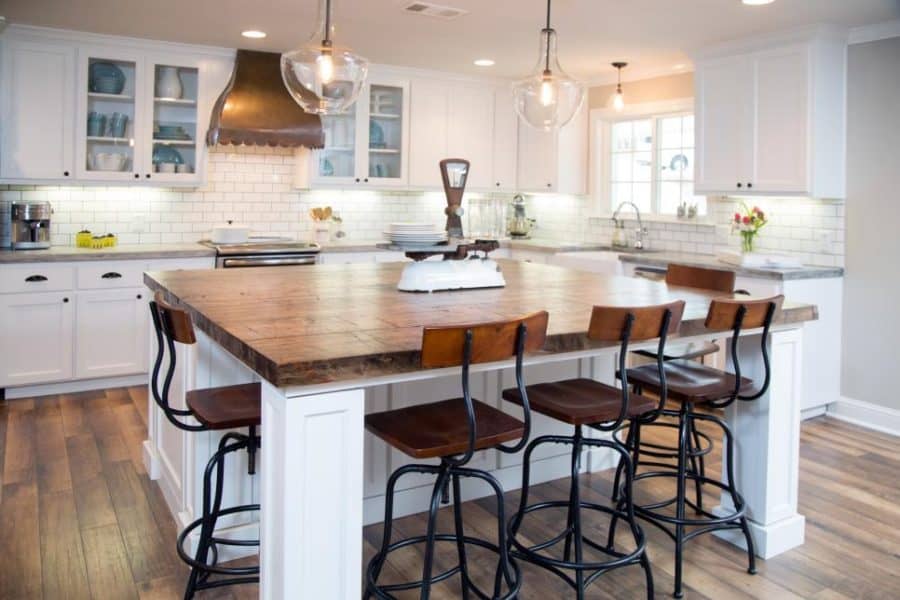 Farmhouse kitchen design with industrial chairs