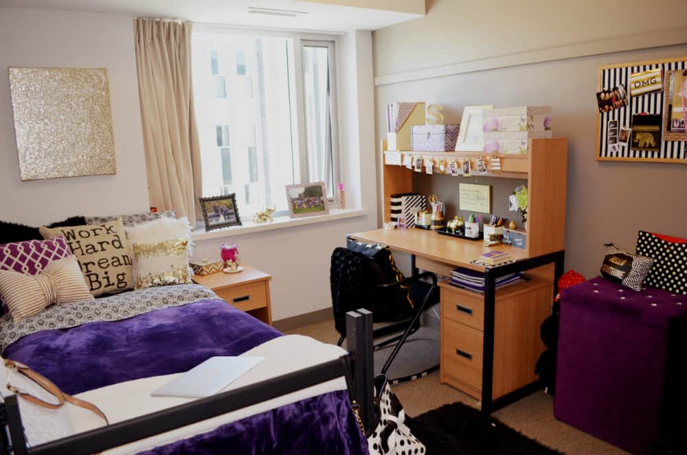 Mid-century dorm room with purple accents