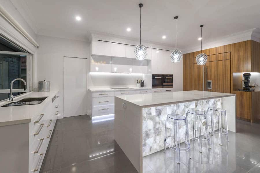 White quartz backlit kitchen island