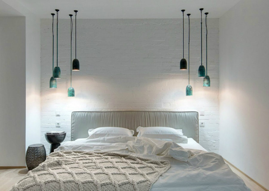Second bedroom with turquoise pendant lights