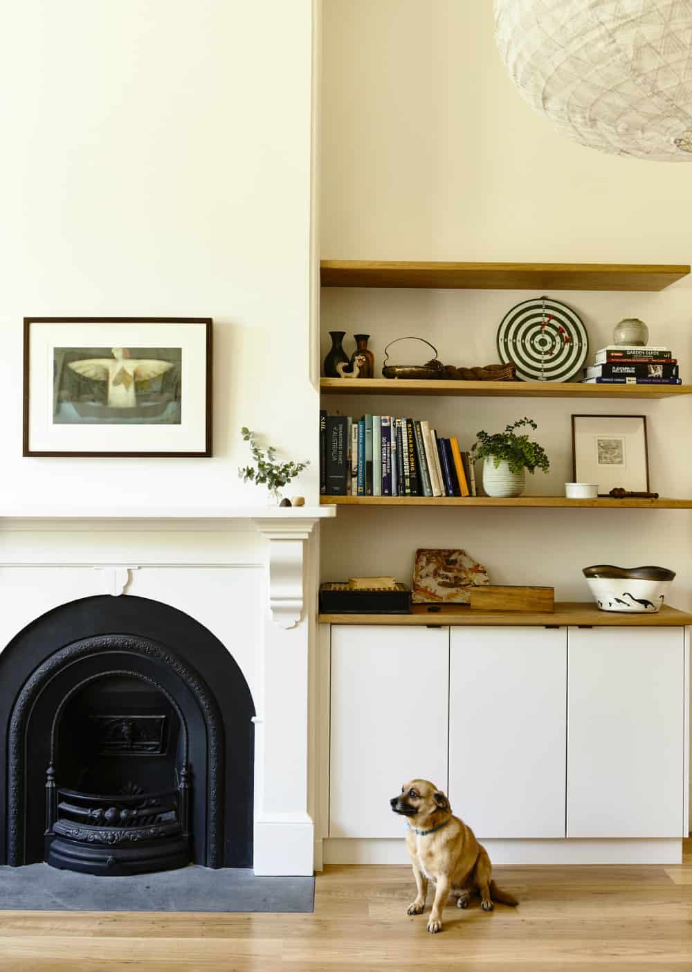 A classic fireplace becomes a design element of the room