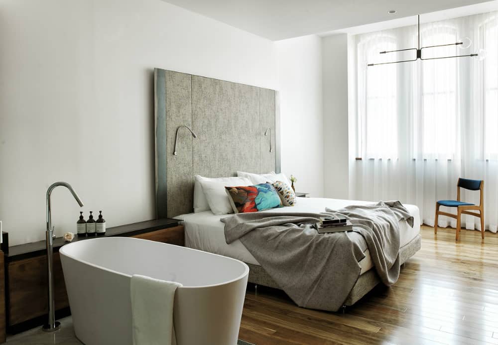 A room with a freestanding bathtub