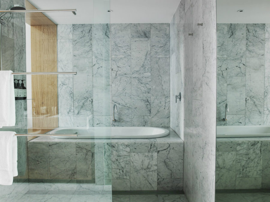 All-marble bath with a tub