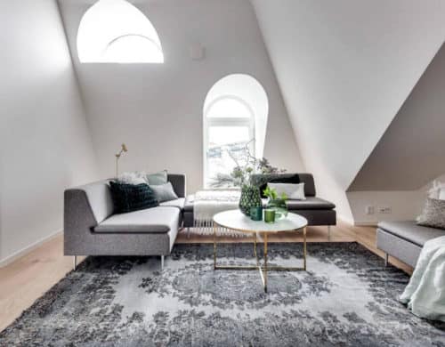 Attic Apartment in Stockholm Dictates Layout and Style