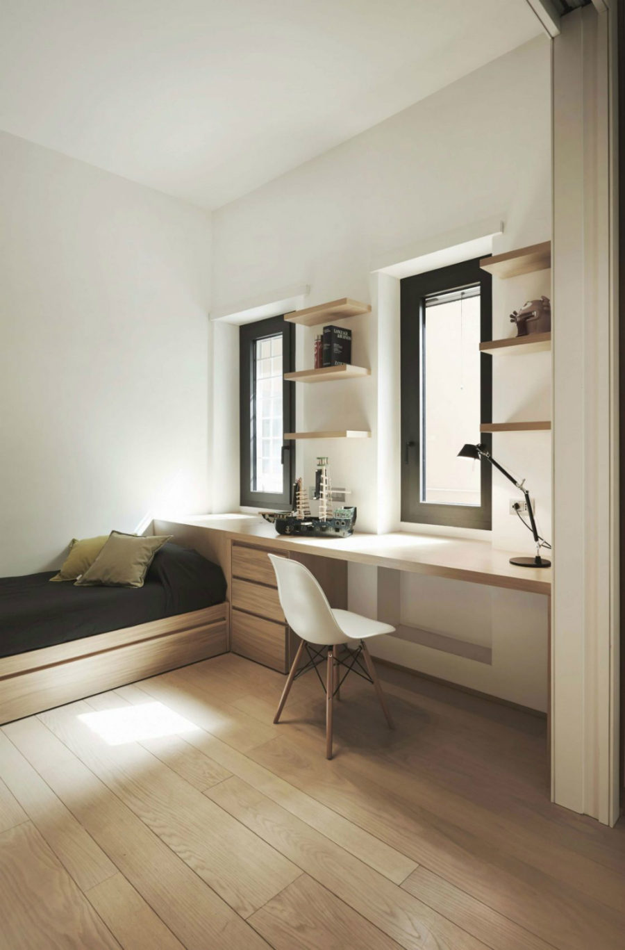 Contemporary kid's room with a built-in window desk