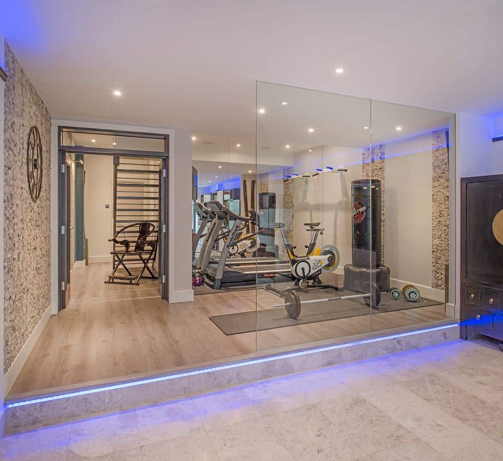 Cool contemporary home gym by London Basement