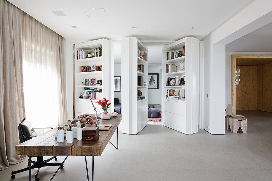 Hidden room doors by Consuelo Jorge Architetos.