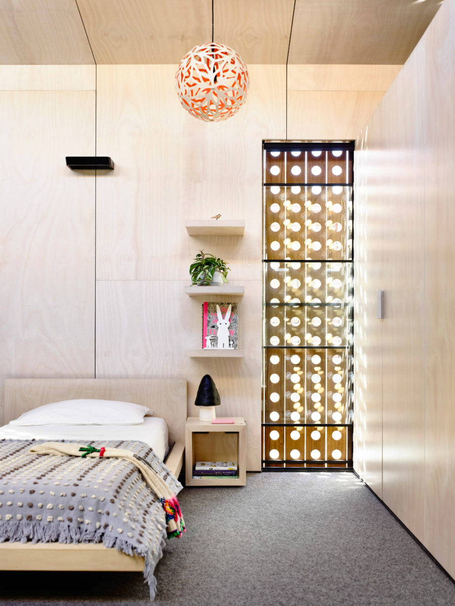 Stylish wood-clad kids room