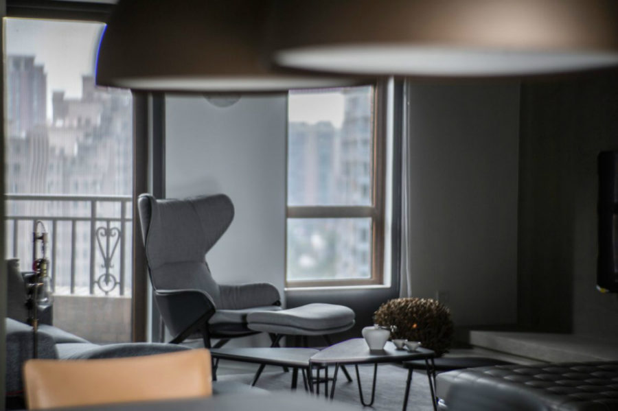 A lounge chair completes the living room arrangement