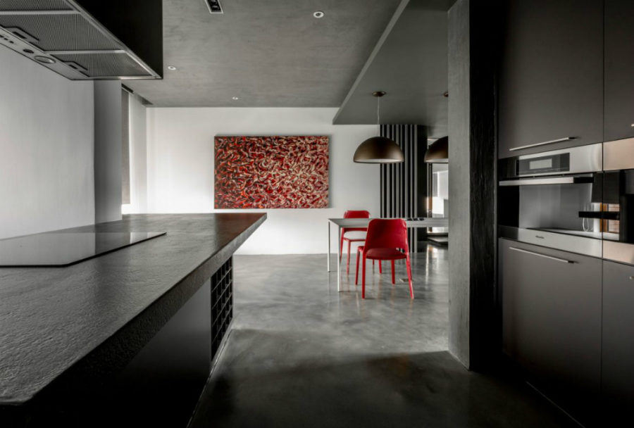 Dining area comes with a pop of contrasting red