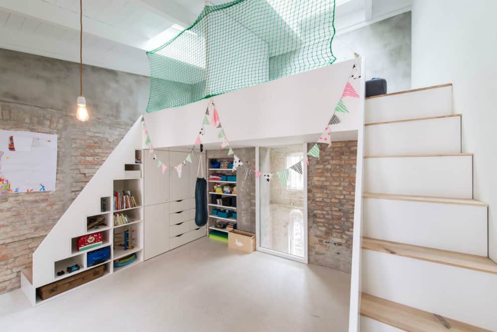 Kids room has okenty of clever storage built into it