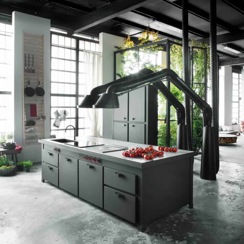 Mammut extractor hoods decorate the kitchen with concrete floors