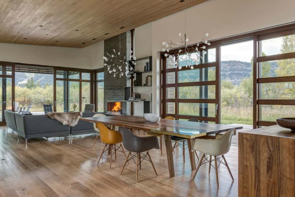 Sliding windowed doors open the dining room up to the picturesque outdoors