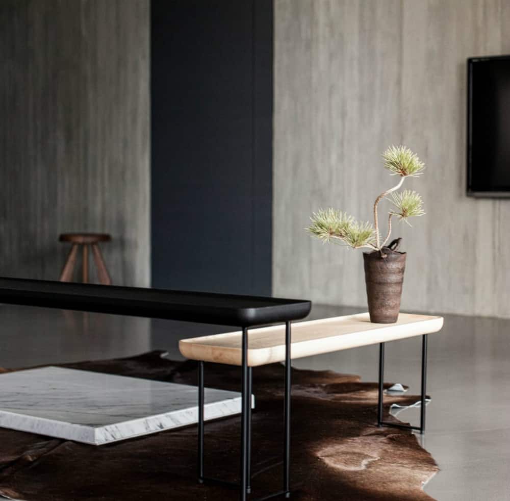 Unconventional coffee tables create a dynamic arrangement