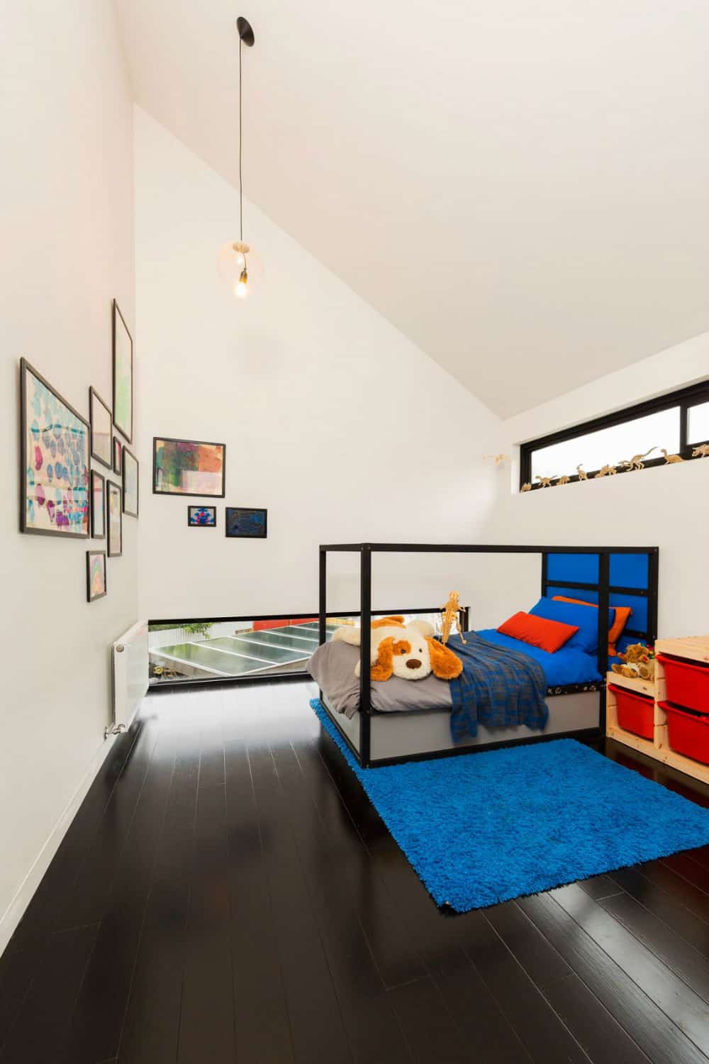 Kids room with a vaulted ceiling