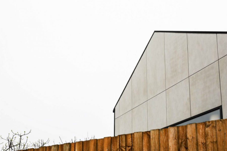 Monolithic siding lends the house its name