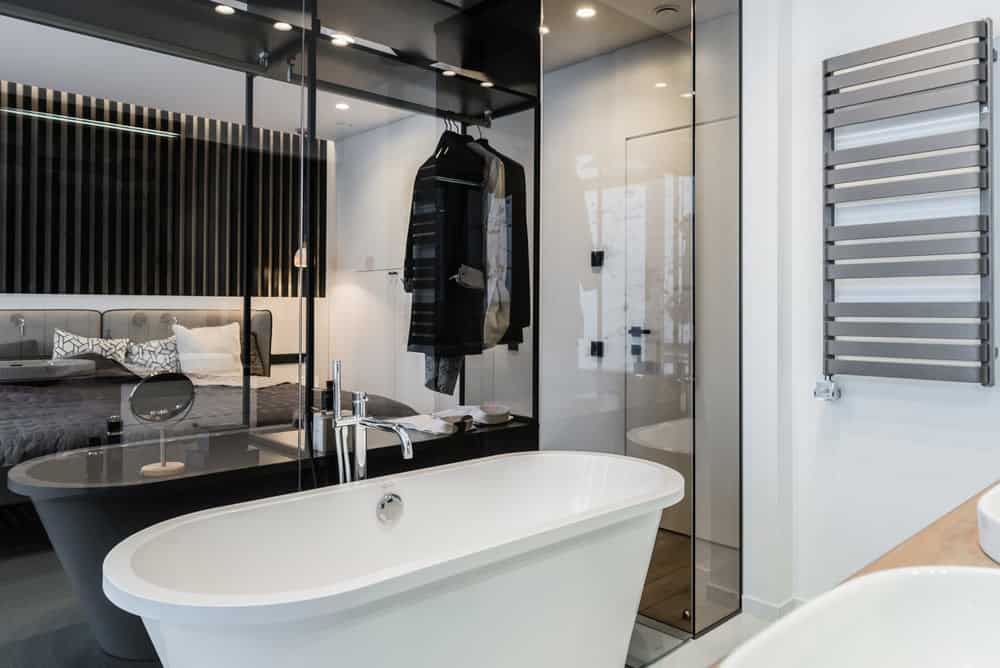 A freestanding tub adds luxury to the entire ensuite