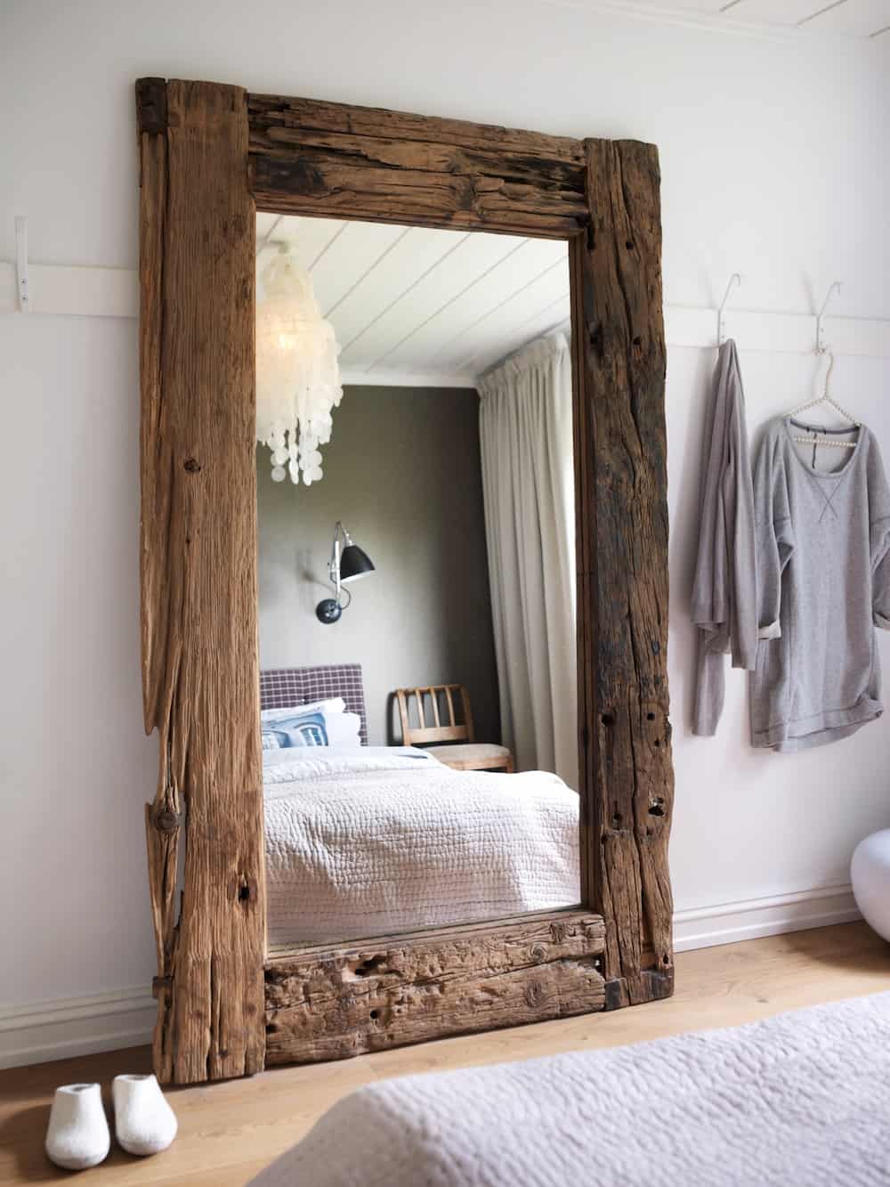 Mirror in a natural wood frame