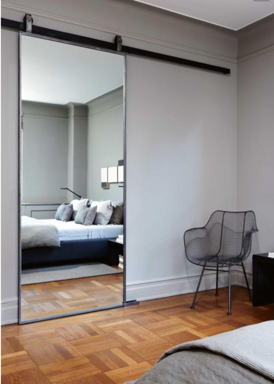 Mirrored bedroom barn door 900x1259 Bedroom Mirror Designs That Reflect Personality