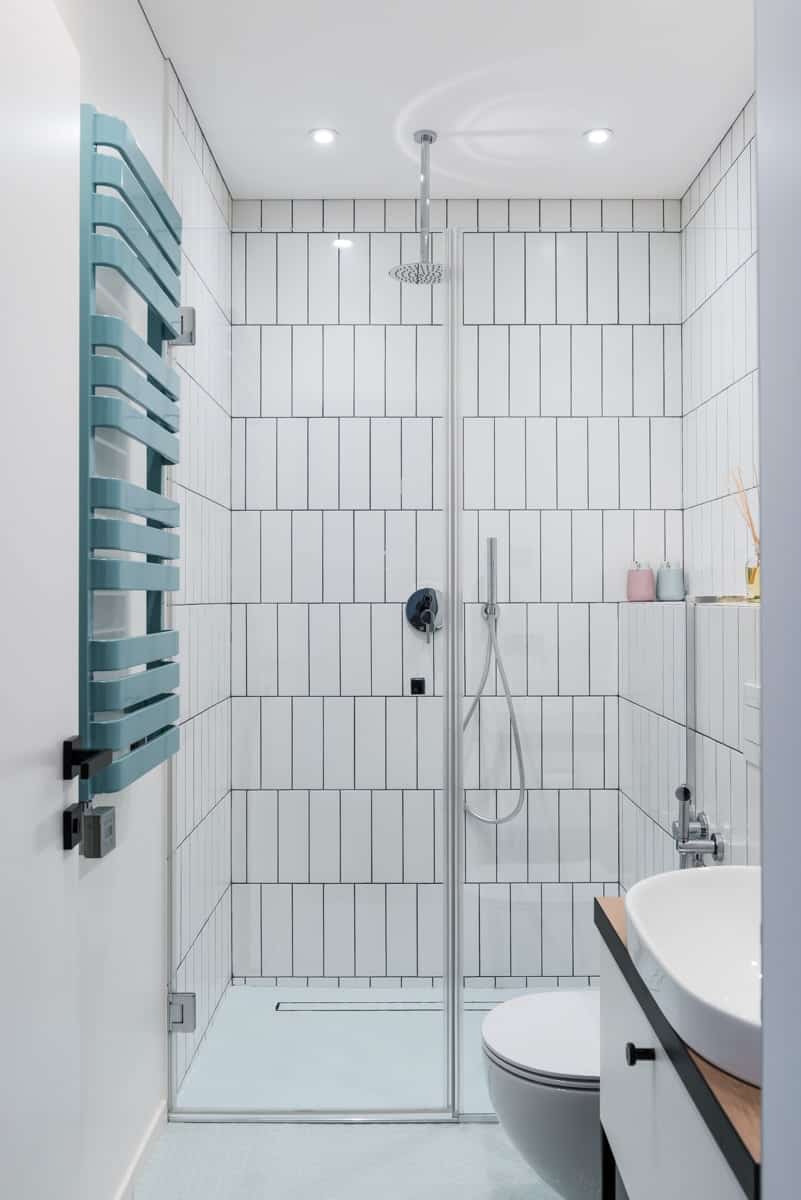 Simple white tiles make for a stylish shower