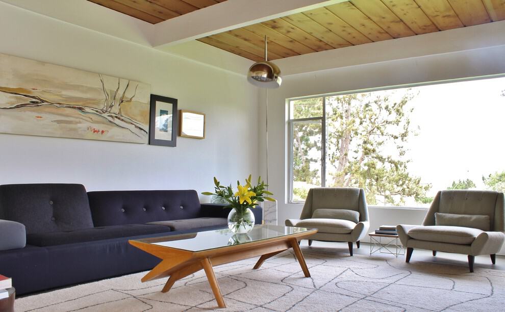 Popular mid century living room with wood ceiling