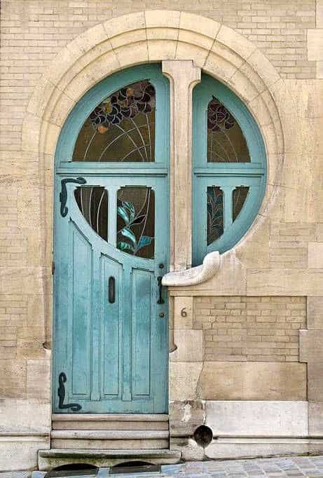 artistic front door with stained glass