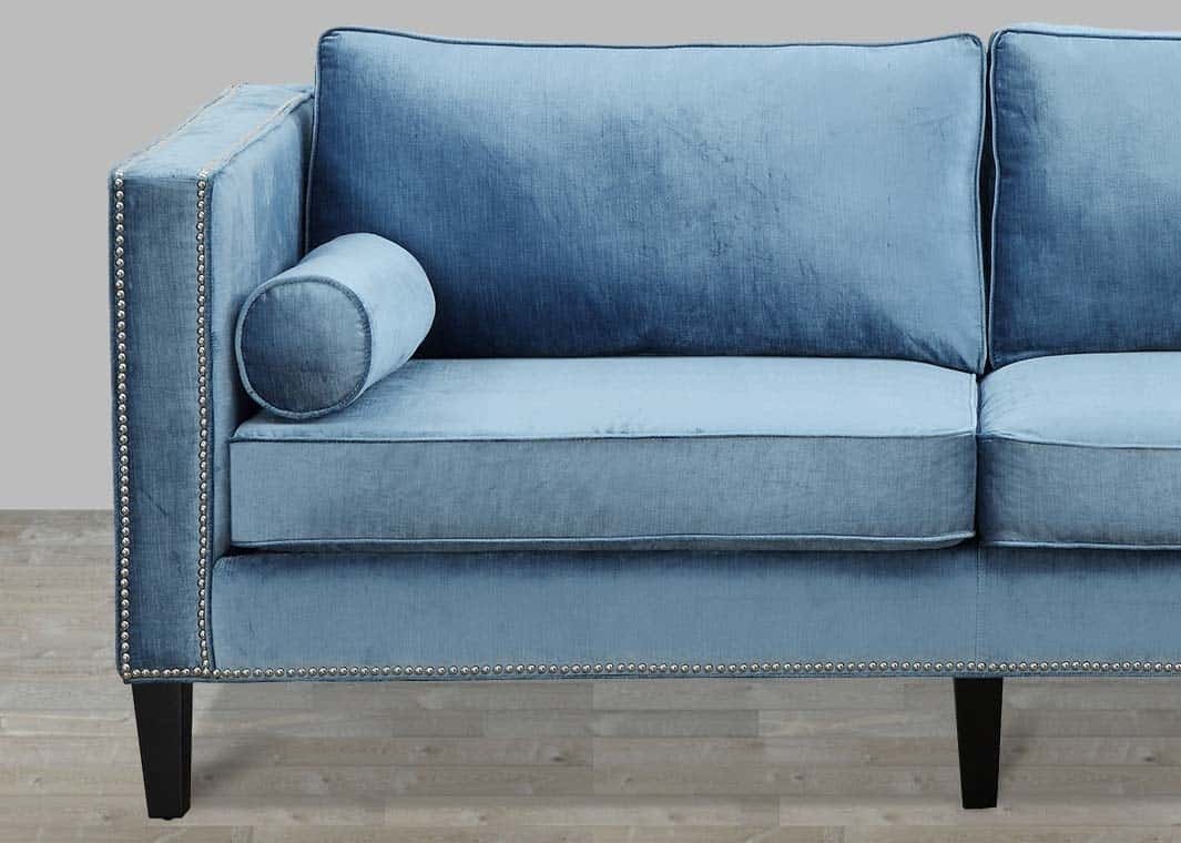 blue-velvet-sofa-with-nailheads