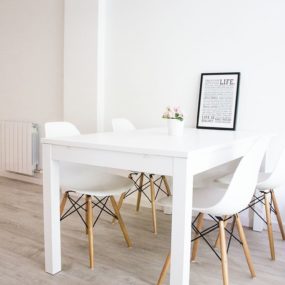Lighten Up Dinner Time With These 15 White Dining Room Tables
