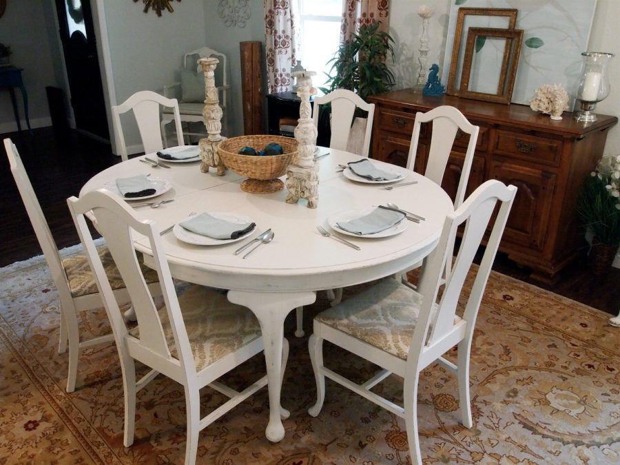 whitewashed round dining room table