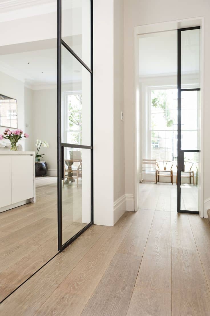 black framed pocket doors 15 Magical Pocket Doors For Your Small Space