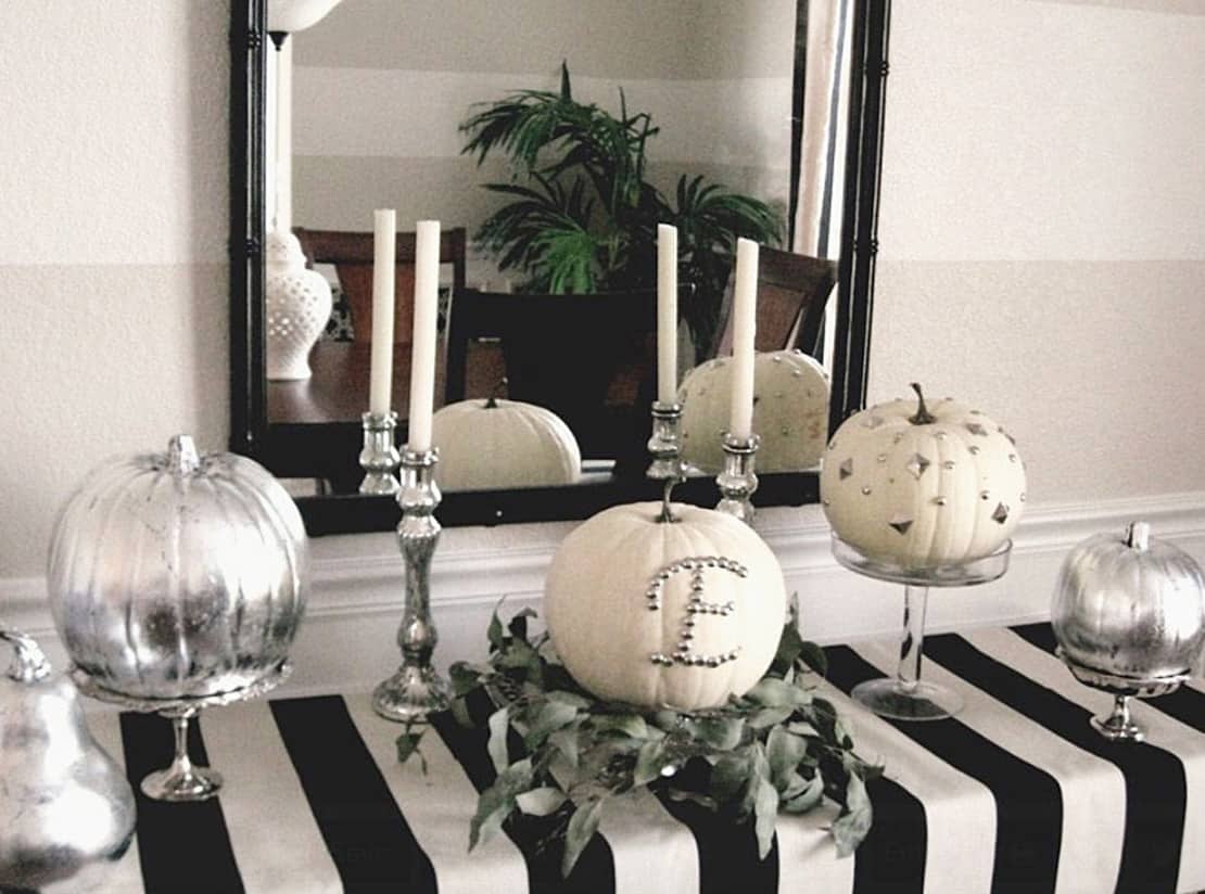 Although we love the idea of black and having black candle holders for an edgy look.