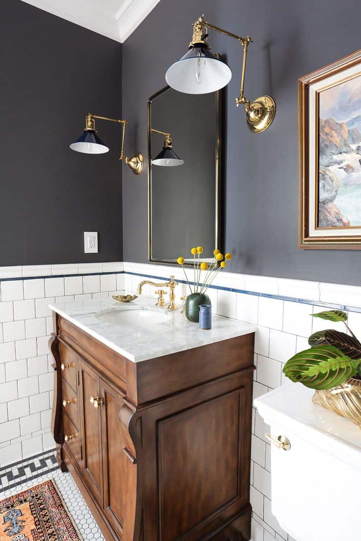 Consider the color charcoal one shade lighter than black. Therefore, if you are hesitant about having black walls in your bathroom but want to have dark walls charcoal is the way to go.