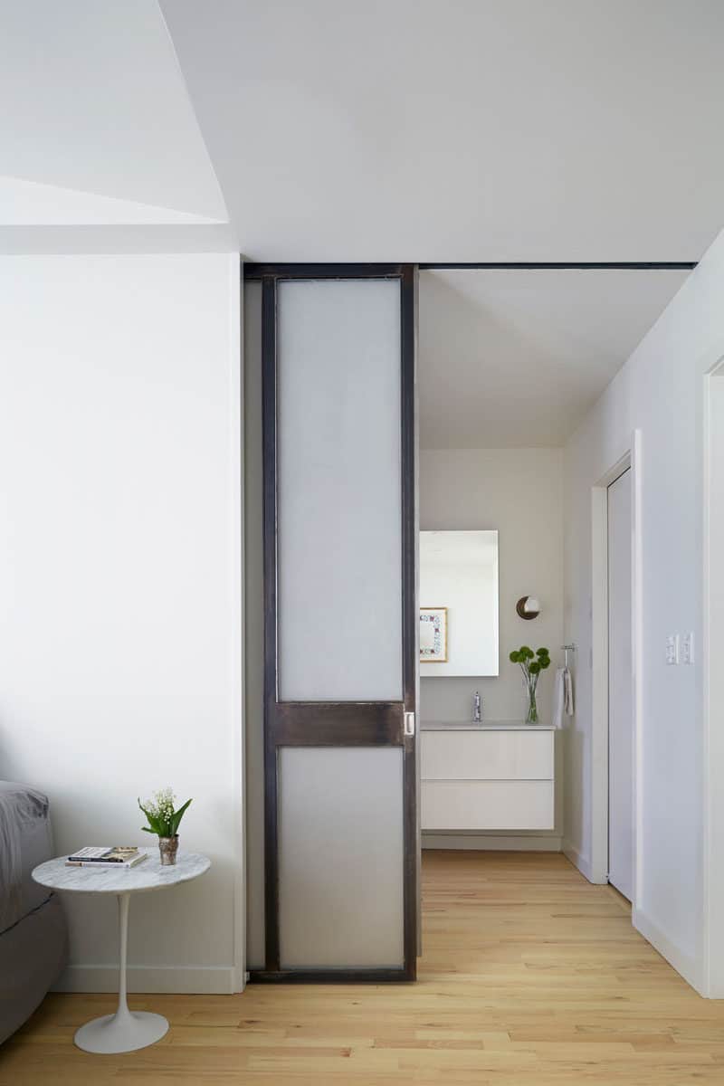 contemporary pocket door 15 Magical Pocket Doors For Your Small Space