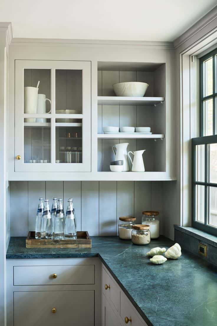 grey kitchen cabinets with green countertops