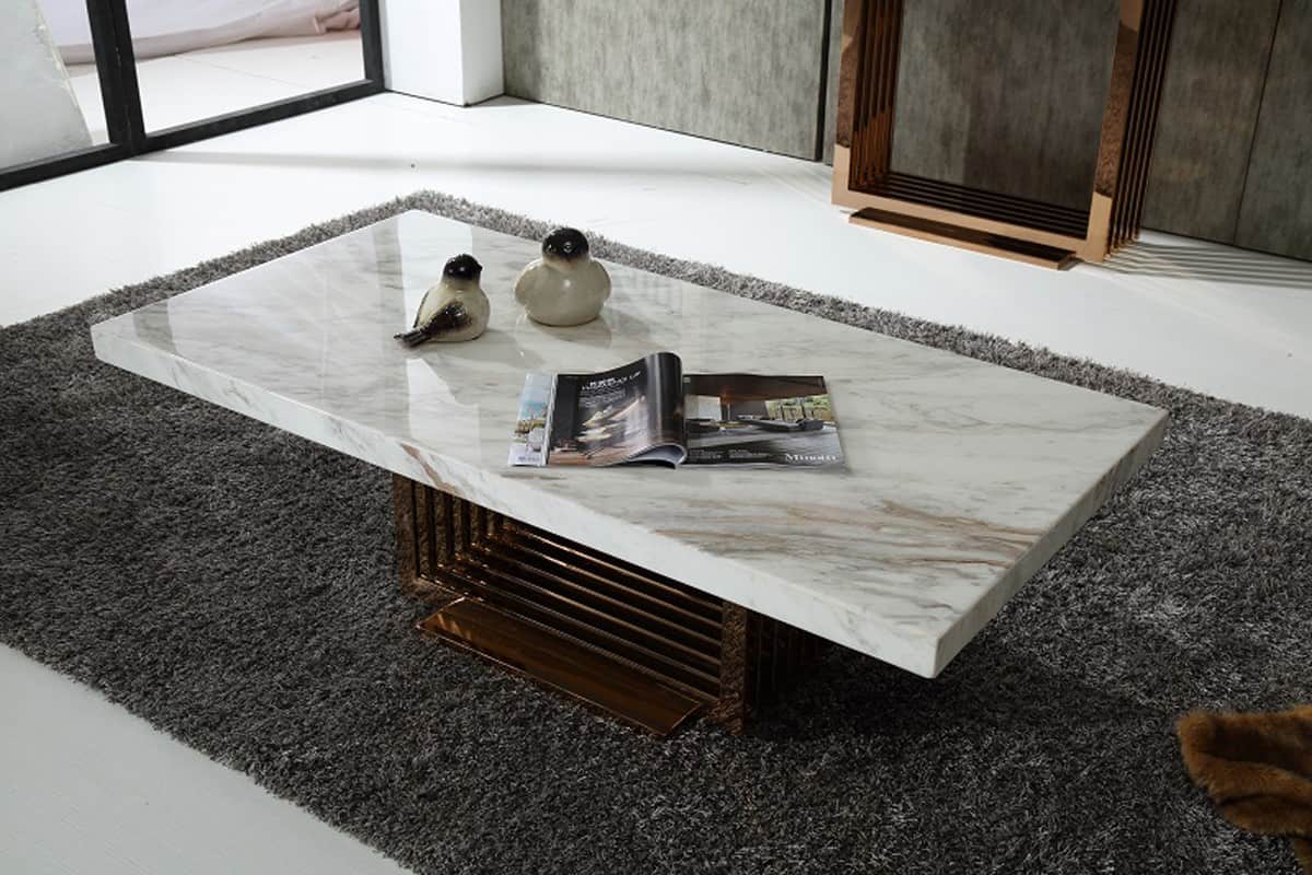 A simple coffee table with marble accents can make the difference you need in your living room.