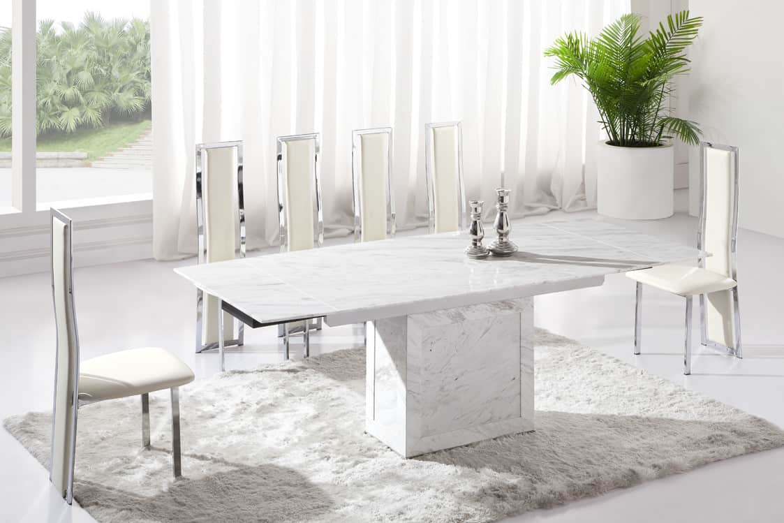 A marble dining table is not common but it sure is a beautiful asset to the home.