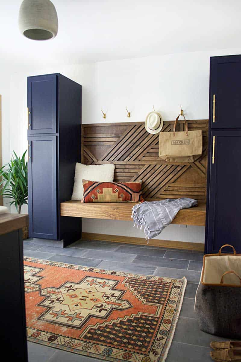 navy mudroom with floating bench