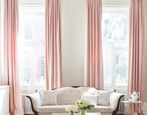 Pink drapes may be exactly what your neutral room may need.