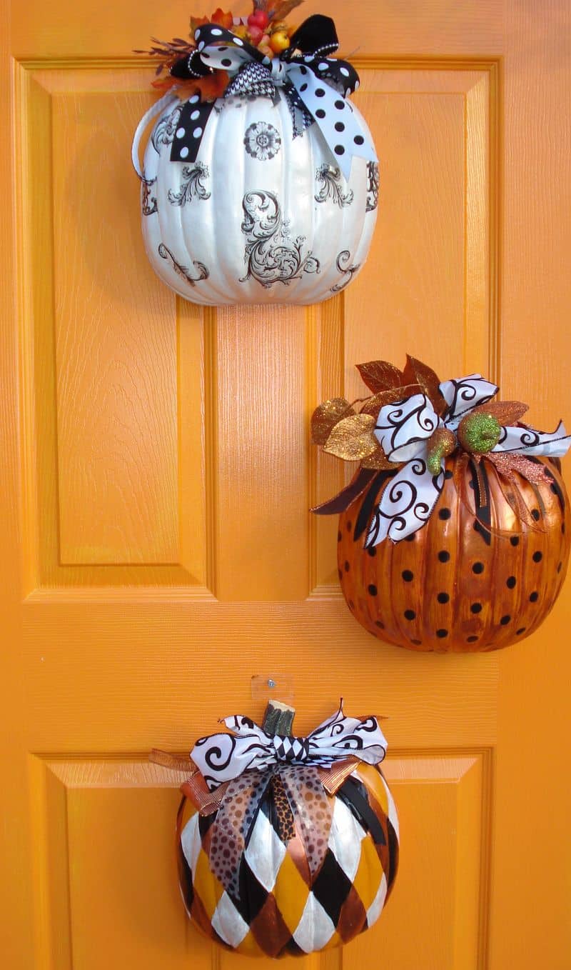 Small pumpkins can be difficult to find or you may not find them as interesting to hang on your door consider using fake