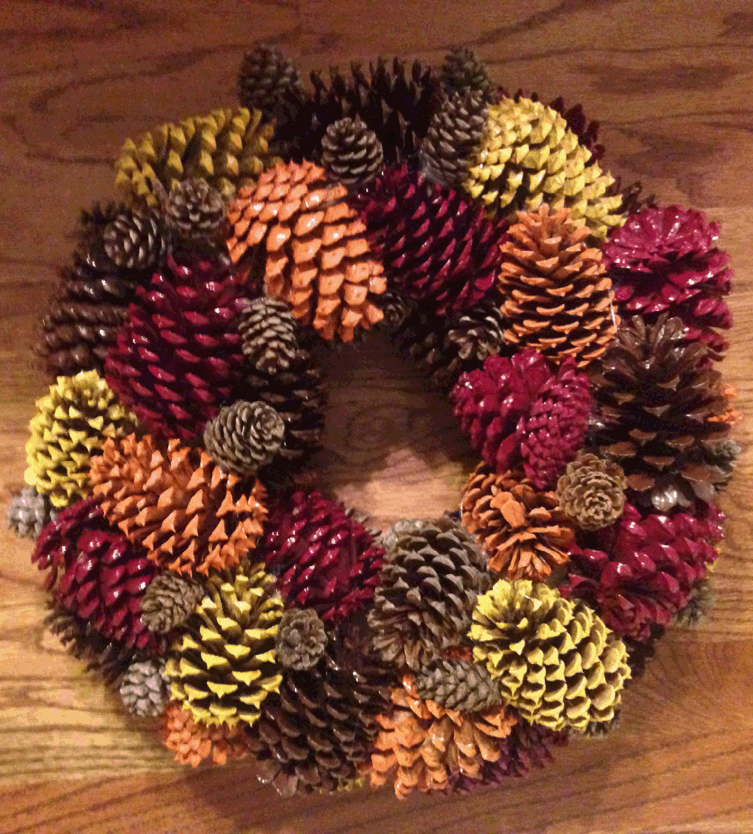 If you must include a wreath what better way to do it then with pinecones