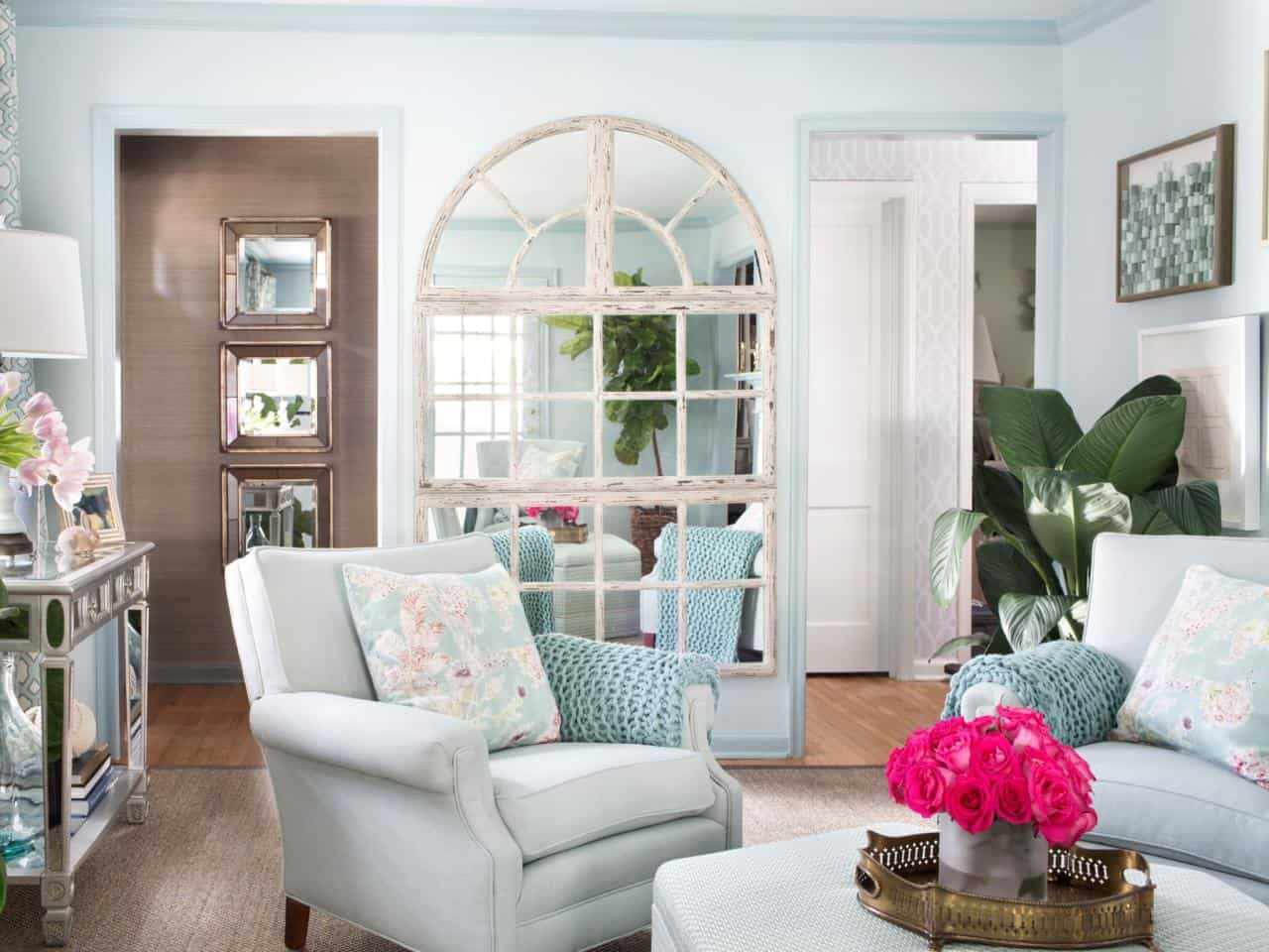 Mirrors add to the space instead which is perfect when you are working with a small living room.