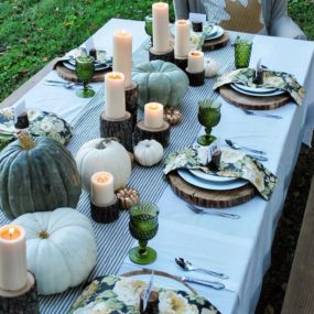 Adding a tablecloth can give the table ambiance and even incorporate pattern.
