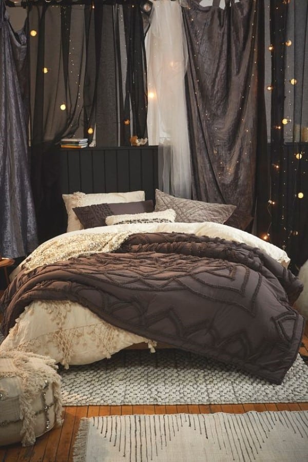 black and cream draped bedroom